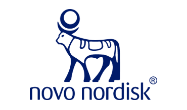 A simple drawing of a bull, turned to the side with the words novo nordisk underneath the bull drawing, all in navy blue