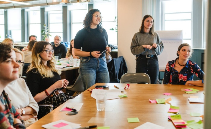 Graphite team members in a workshop