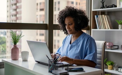HCP using laptop in office Website image gallery