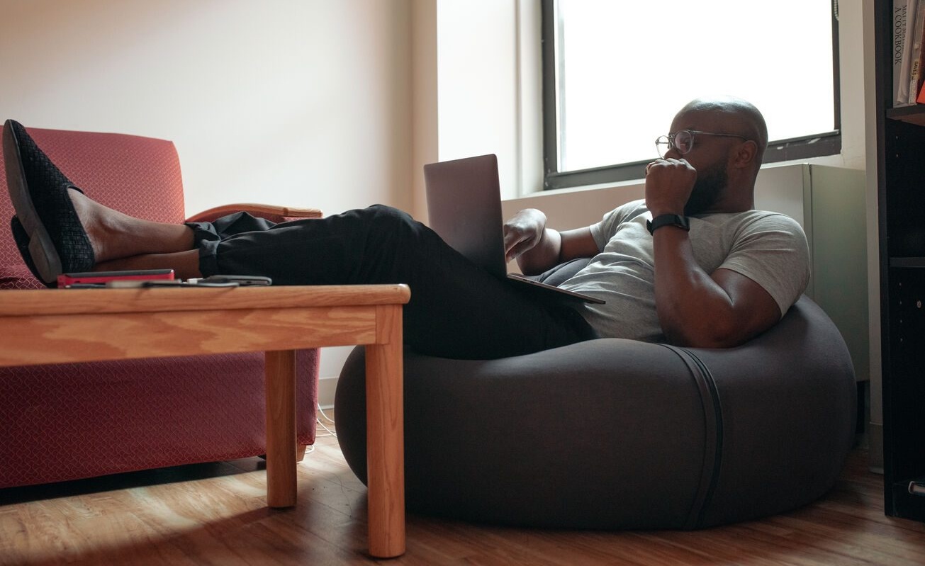 Man using laptop diary study